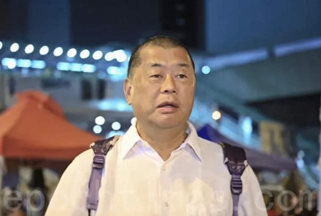 苹果日报 拜登 黎智英 西蒙 马克 造假